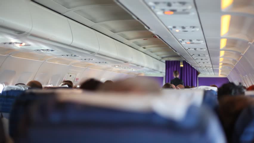 Steward in plane salon 