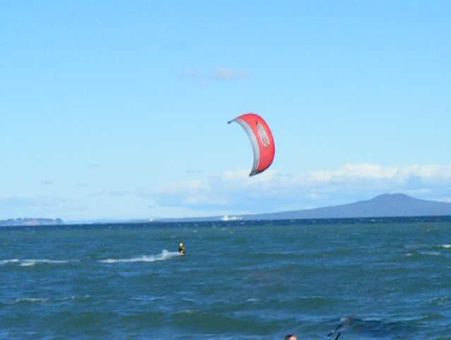 A clip of a kite surfer on a windy day