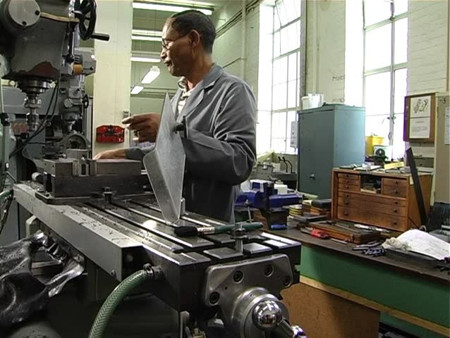 Milling machine operator tracking shot