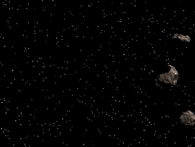 Flying through space as many asteroids or debris fly by, spinning and turning.  No audio.  Can be sped up or slowed down