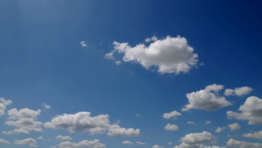 Seamless HD 1080p Time lapse clouds over blue sky captured with 12mpix DSLR camera. Film flicker noticeable.
