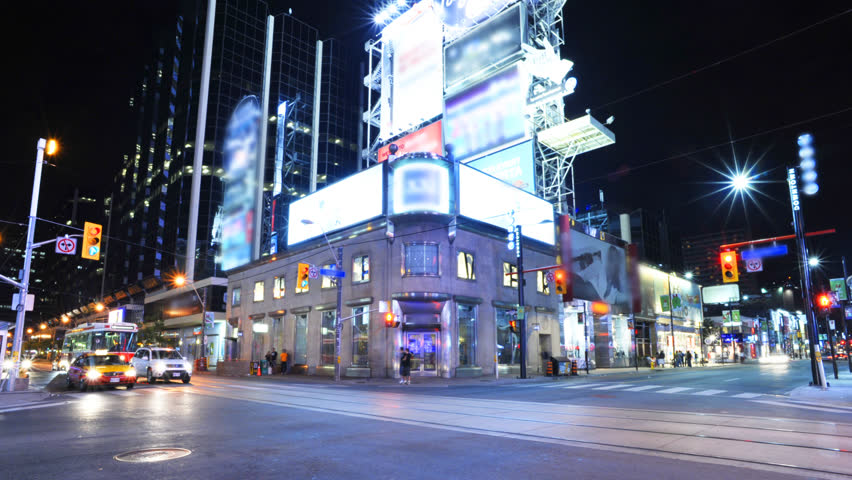 HD timelapse of city street corner. Long exposures accentuate speed of traffic and people. All logos, faces and license plates have been carefully obscured, frame by frame.