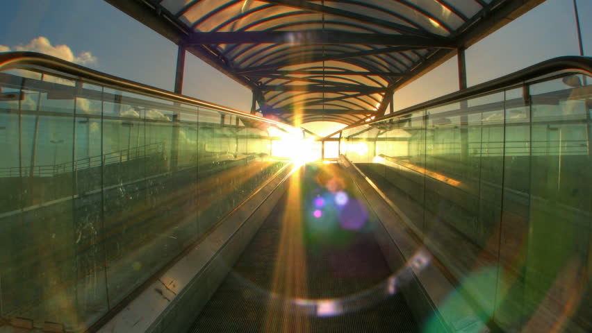 Sunset lights on escalator, HD motion time lapse clip, high dynamic range imaging