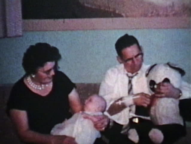Proud grandparents visit with their brand new grandson.