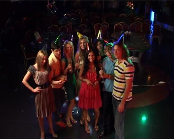 Group of young happy people celebrating Christmas