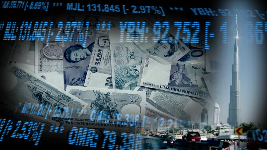 DUBAI - Financial place: A finance Montage shows the Burj Khalifa (Dubai) with a dolly move over different currency and rate ribbons, Dubai, UAE.