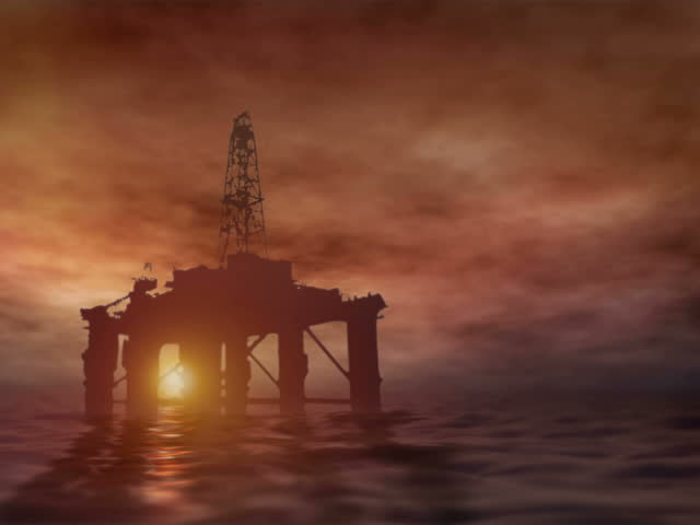 Oil rig at sea with the setting sun behind. The end of oil? Digitally generated, seamlessly loopable. PAL