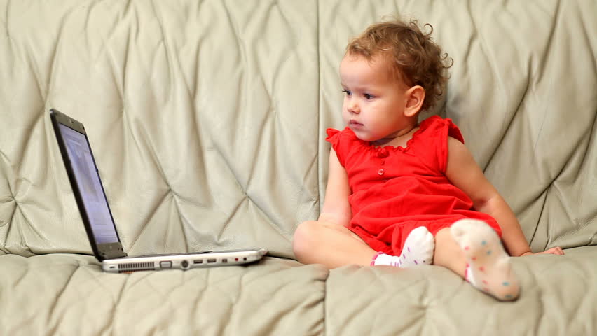 Cute baby working on computer
