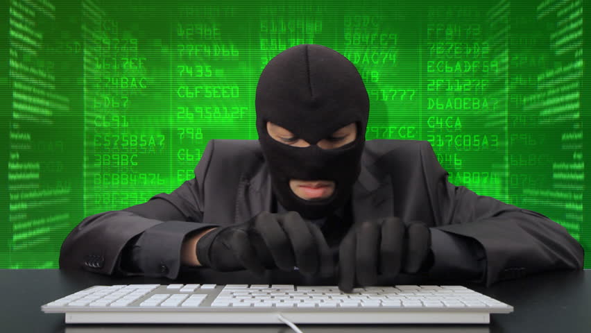Computer hacker wearing black suit trying to break into your computer 