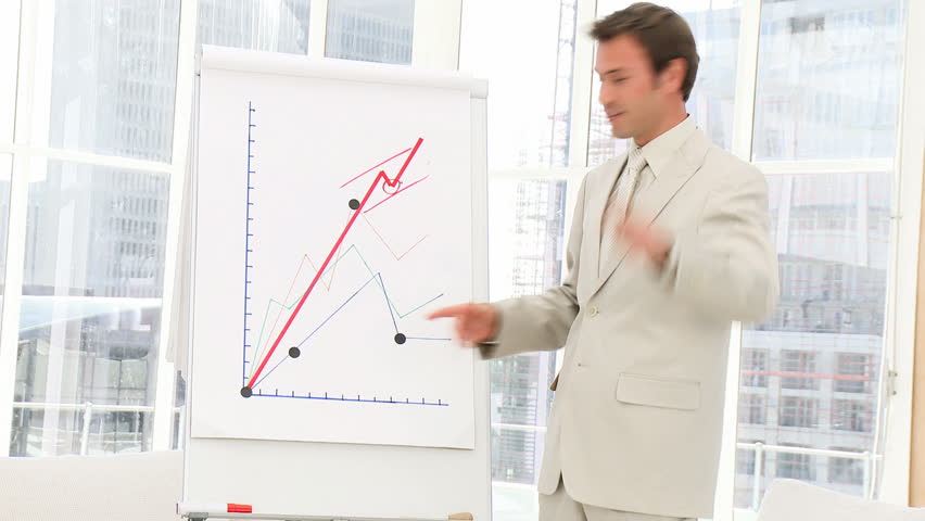 Charismatic businessman doing a presentation in the office