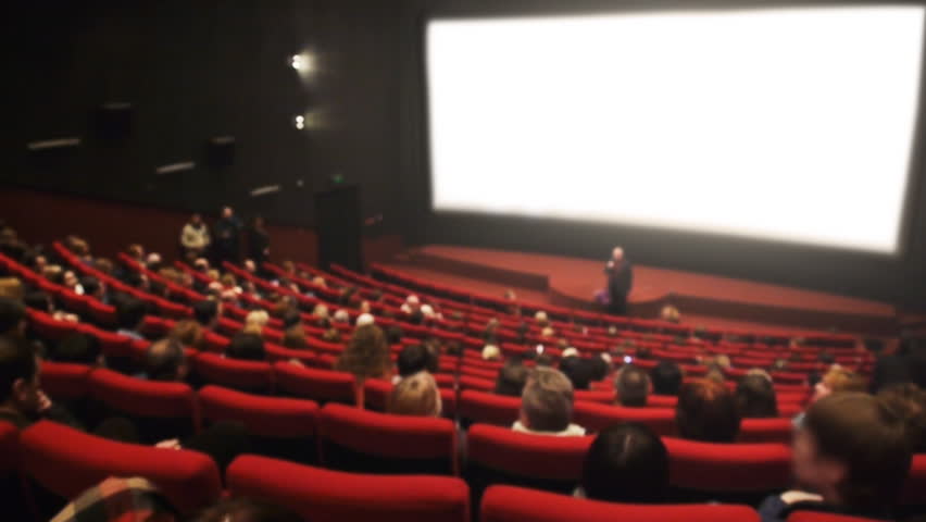 Audience in the cinema hall is applauding, with Sound.