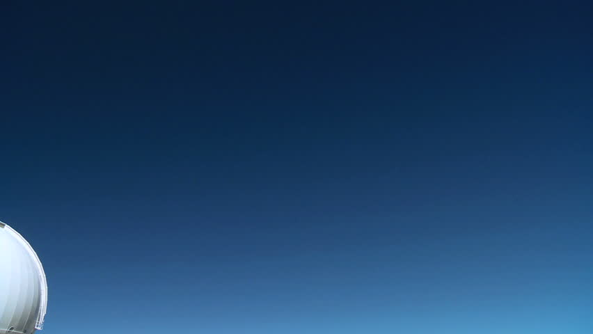 Domed astronomy observatory in barren elevated position