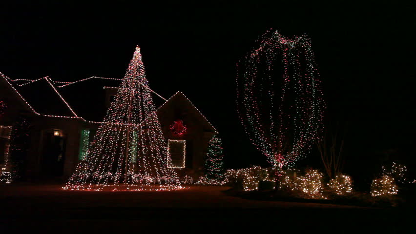 Dynamic illumination of the house exterior during Christmas in the dark