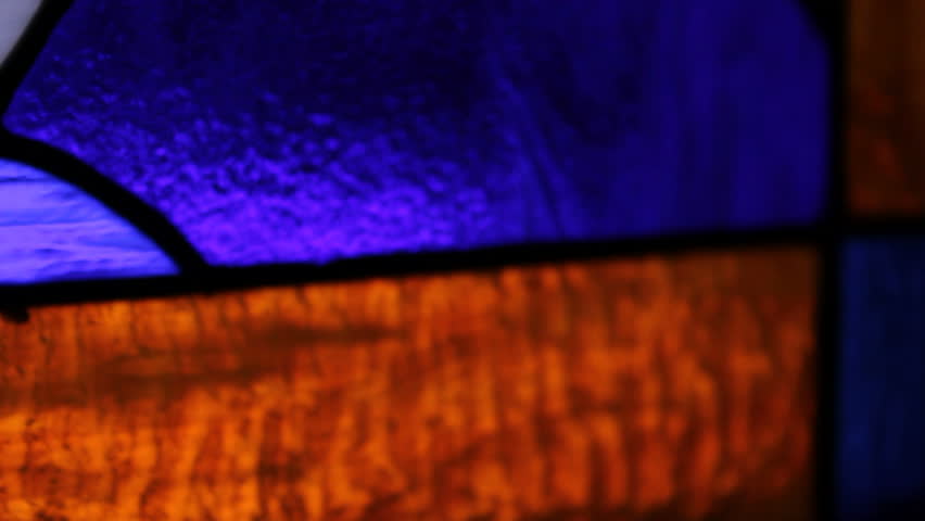 Panning across a stained glass window.