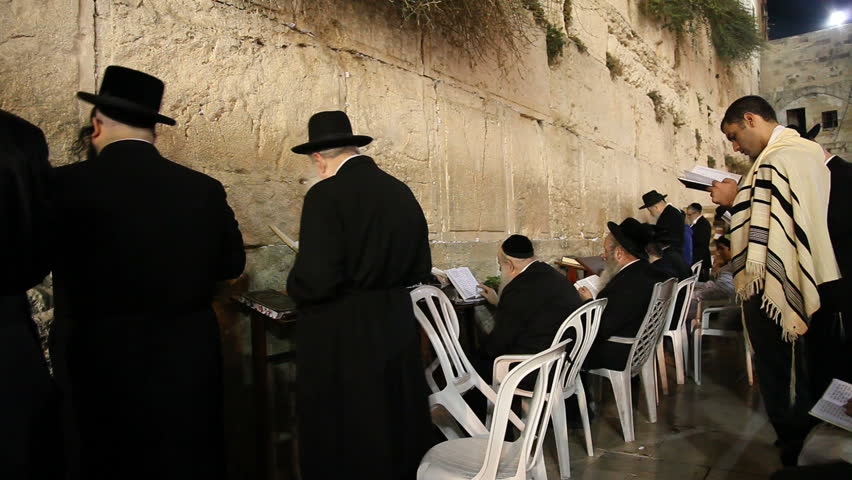JERUSALEM, ISRAEL Ã¢â¬â SEP 18: Midnight prayers are reciting Slihot (penitential prayers) and imploring until Yom Kippur at the Western Wall, September 18, 2009.