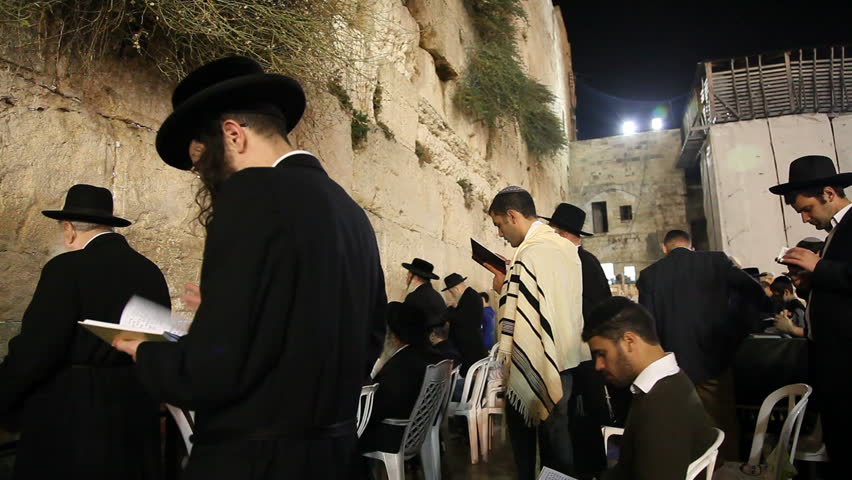 JERUSALEM, ISRAEL Ã¢â¬â SEP 18: Midnight prayers are reciting Slihot (penitential prayers) and imploring until Yom Kippur at the Western Wall, September 18, 2009.