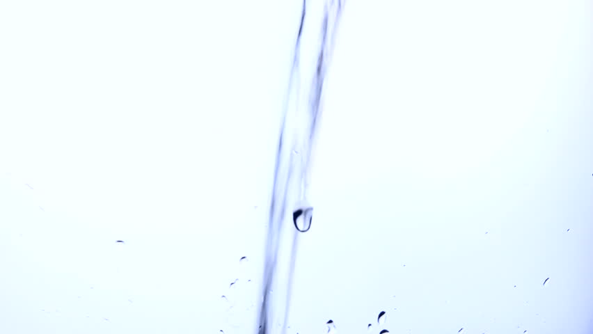 Clear, refreshing pours into glass filling frame. Shot in studio, not computer generated