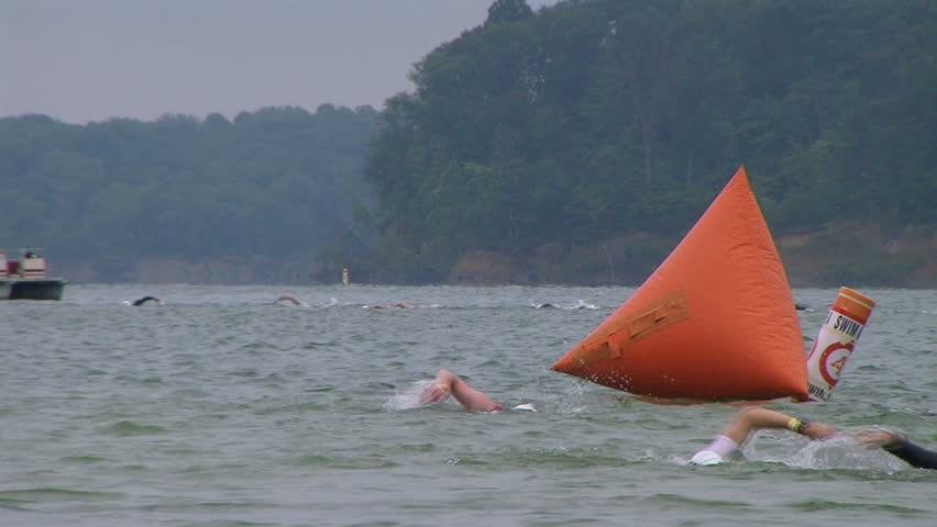 WAYNESVILLE - JULY 5: Swimmers (names withheld) from Ohio competing during the swim leg of the Ohio Challenge Triathlon held at Caesar Creek State Park July 5, 2009 in Waynesville, OH. 