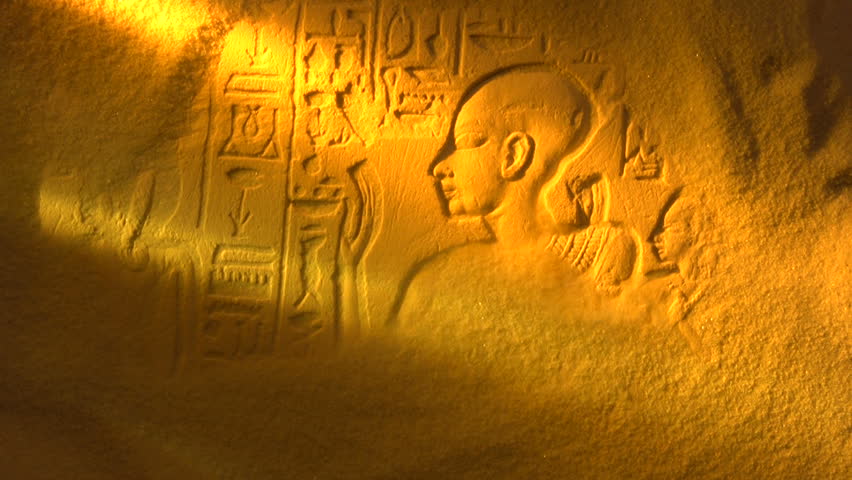 Desert sand blows away to reveal ancient Egyptian Hieroglyph, shot in studio NOT computer generated