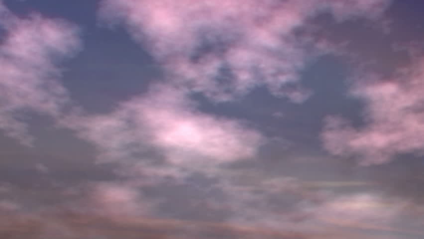 A flock of pigeons swoops and dives across the sky at dawn, Entering from the right, they exit at the top.  HD 1080. Digitally generated.