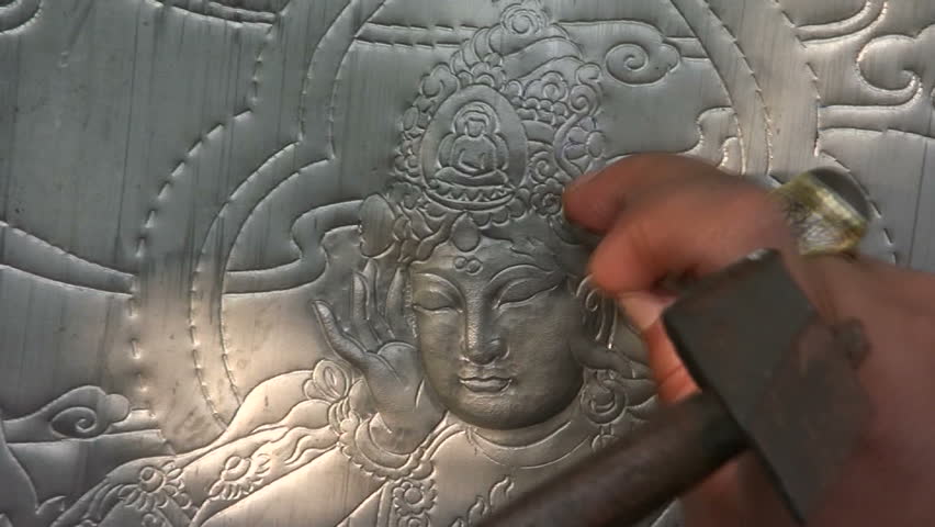 Thai sculptor makes traditional Buddhist art.