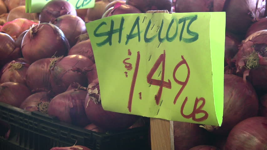 Shallots for sale. Tilt down to bin. 