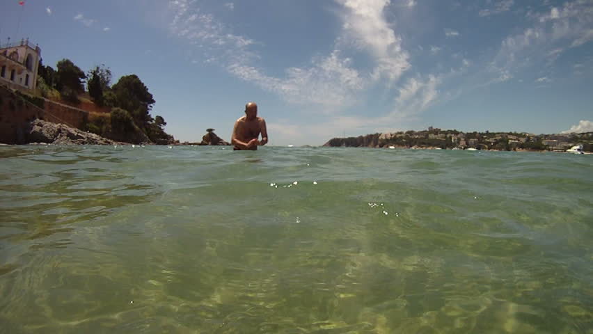 Man swimming in sea