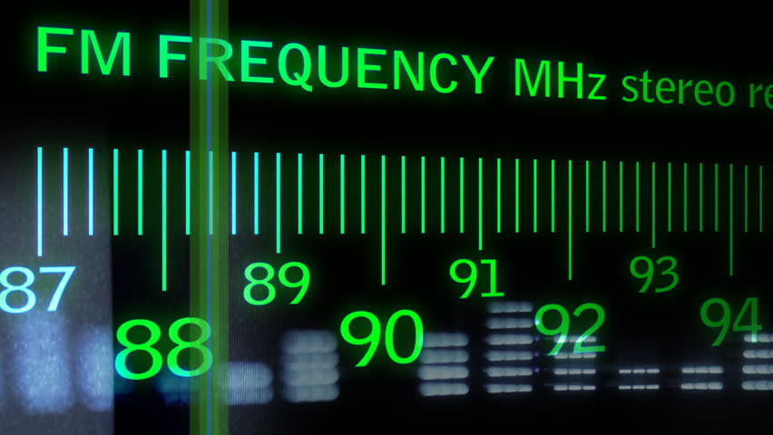 motion graphics an analogue radio dial tuning in different radio frequencies