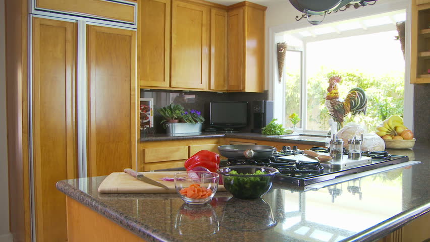 Woman preparing meal in kitchen