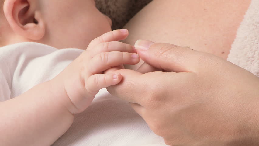 Mother nursing baby