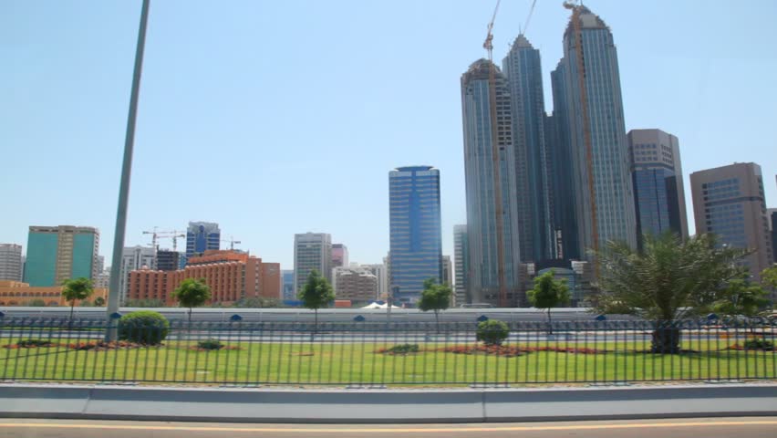 skyscrapers in Abu Dhabi, view from moving car