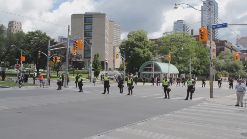 TORONTO, ONTARIO - JUNE 24th: Police line University Avenue on June 24th, 2010, Toronto, Ontario, Canada. Approximately 10,000 uniformed police officers were deployed during the G20 summit in Toronto.