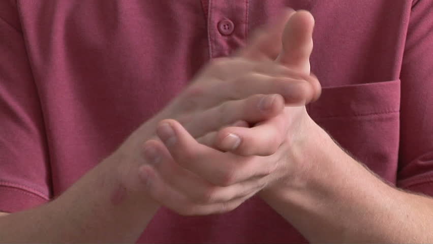 Close up of male clapping his hands	