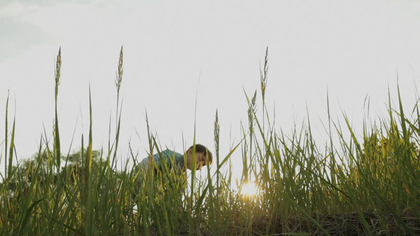 A boy plays baseball. 