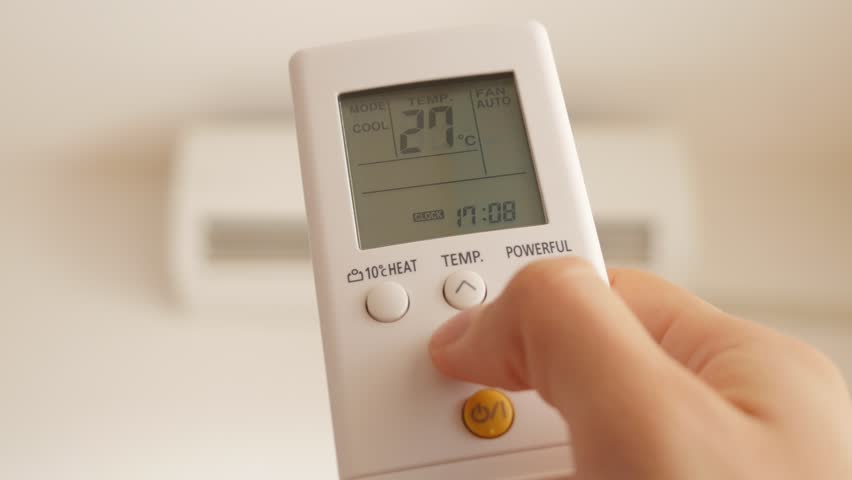 Cooling Down Room By Changing Temperature On Air Conditioner