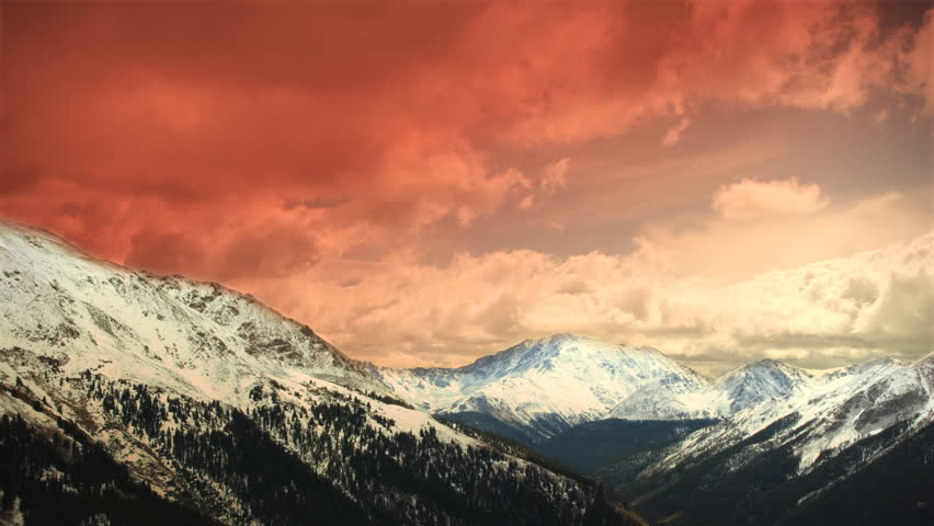 Early Early Winter Mountains Snow Sunset Clouds Skiing. Great for themes of skiing, winter sports, adventure, mountains, nature, weather, tourism, travel. Excellent loop for nature composites.