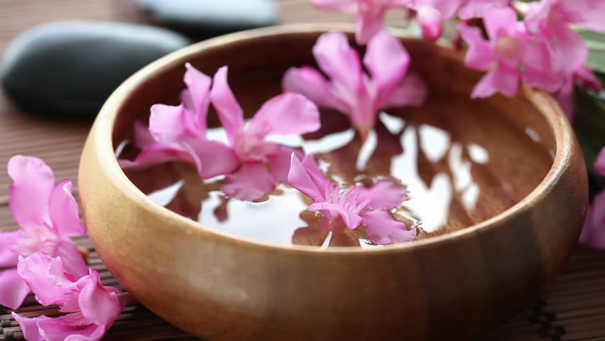 flowers floating in bowl