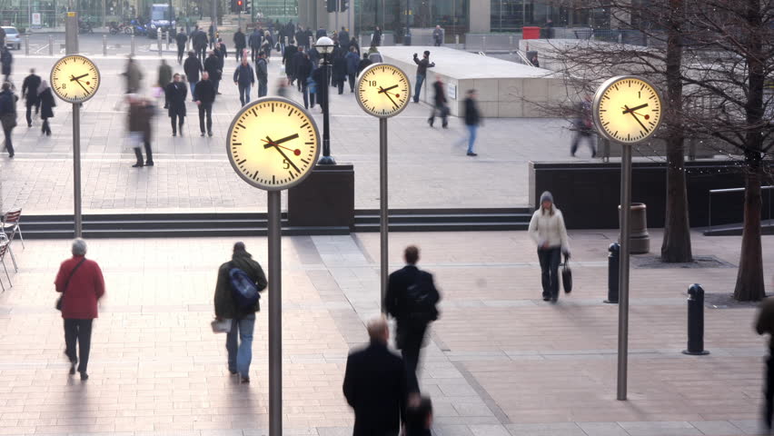 LONDON - MARCH 07: crowds of people rushing around in docklands, London's financial centre, London, UK. MARCH 07, 2009. (Time Lapse)