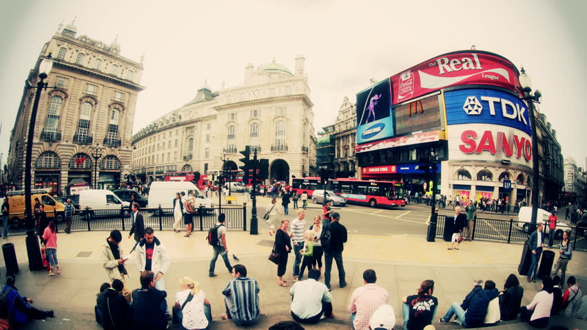 LONDON - MARCH 07: fisheye shot infront of Eros statue, Piccadilly circus, London, UK. MARCH 07, 2009. (Time Lapse)