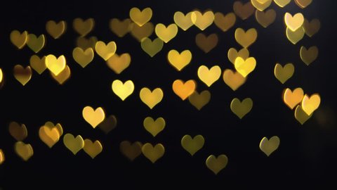 Panning Zooming Golden Heart Bokeh Love Stock Footage Video (100%  Royalty-free) 1007329381 | Shutterstock