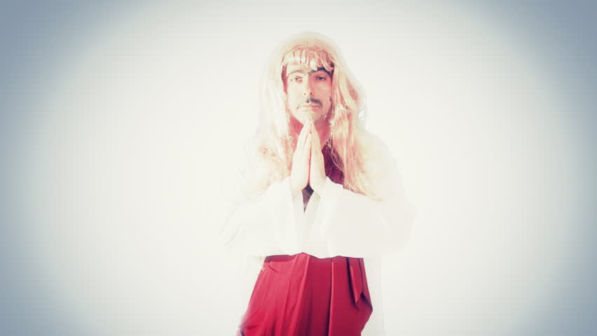 An Ugly Man Dressed As A Saint With A Tunic And A Blonde Wig