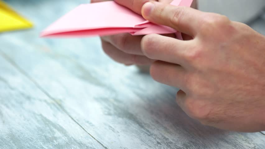 Man Folding Pink Origami Frog Stock Footage Video 100 Royalty Free 1010408651 Shutterstock