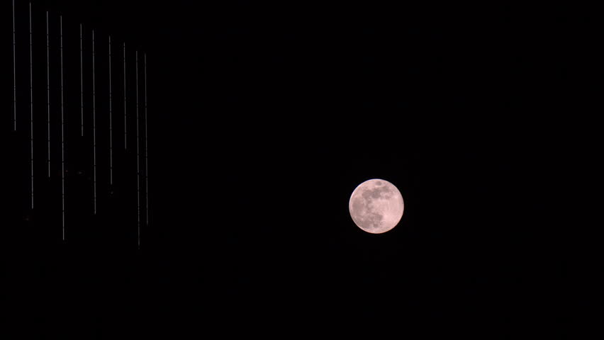Full Moon In April Is Stock Footage Video 100 Royalty Free Full Moon In April Is Called Pink But For Reasons Unknown To The Videographer This Rising Does Ear With Illuminated Modern High Rise