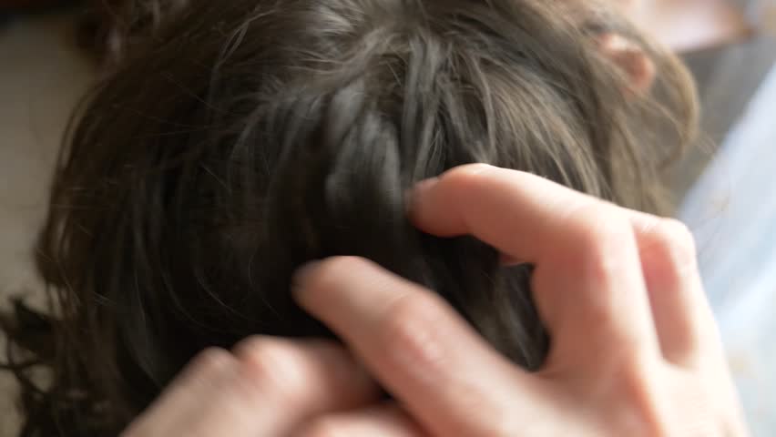Close Up 4k Slow Motion Female Hands Finding Lice On Heads With