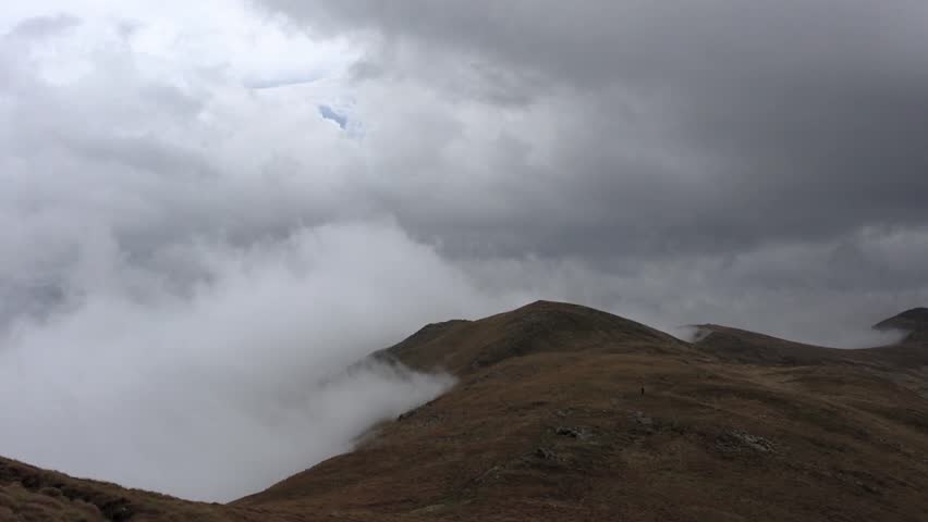 Mountainous landscape with heavy clouds and fog image - Free stock ...