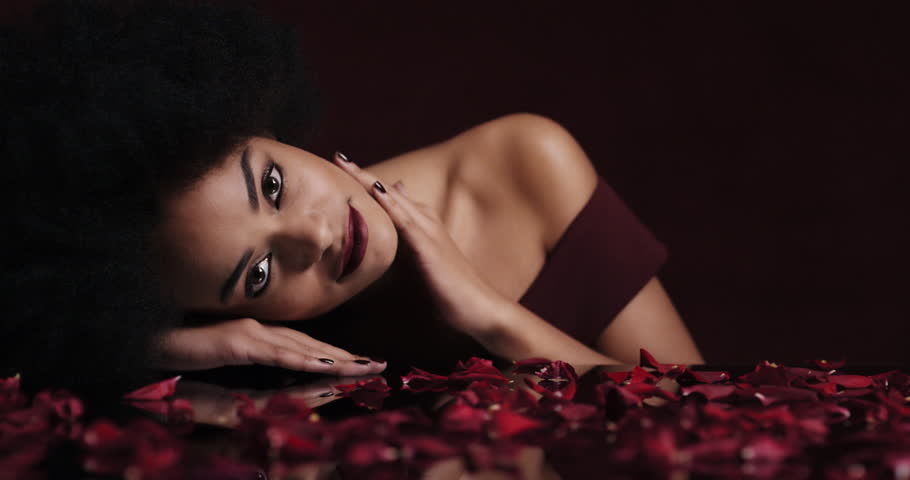 Portrait Beautiful African American Sexy Woman Relaxing Rose Petals Falling On Soft Skin Sensual Female Dreaming Of Intimate Fantasy Romance Indulging Portrait Beautiful African American Sexy Woman Relaxing Rose Petals Falling On Soft Skin Sensual Female Dreaming Of Intimate Fantasy Romance Indulging