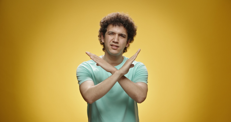 4k00 15guy Gesturing No Young Asian Man With Curly Hair In Casual