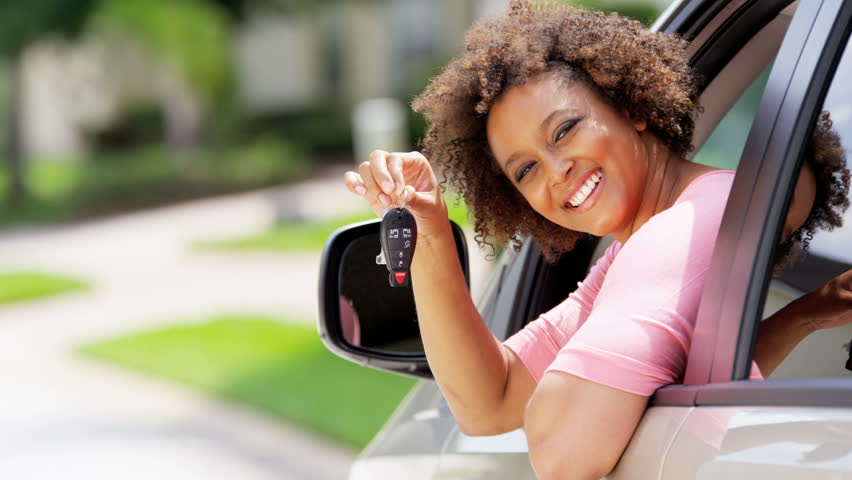 Car keys ayla. Afro African girl Driving.