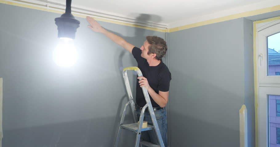 Man Standing On Ladder And Stock Footage Video 100 Royalty Free