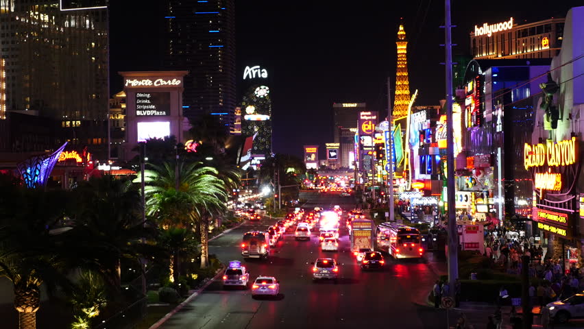 Zoom Out - Busy Casino Traffic On The Las Vegas Strip - Night - Circa ...